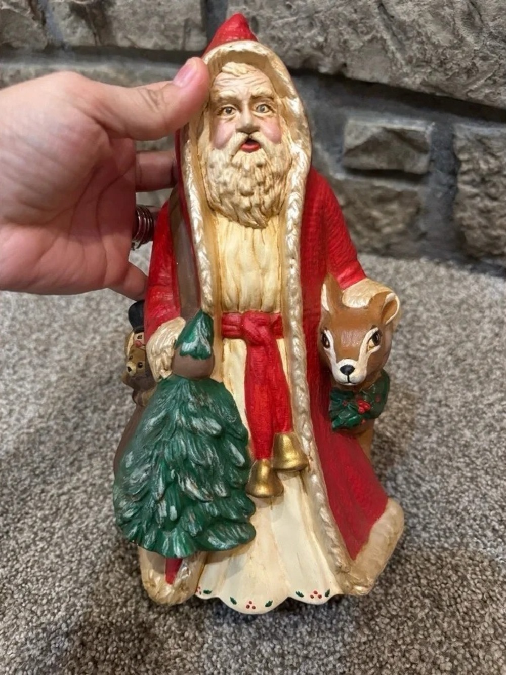 Festive Red Santa Figurine with Green Tree and Deer Accent